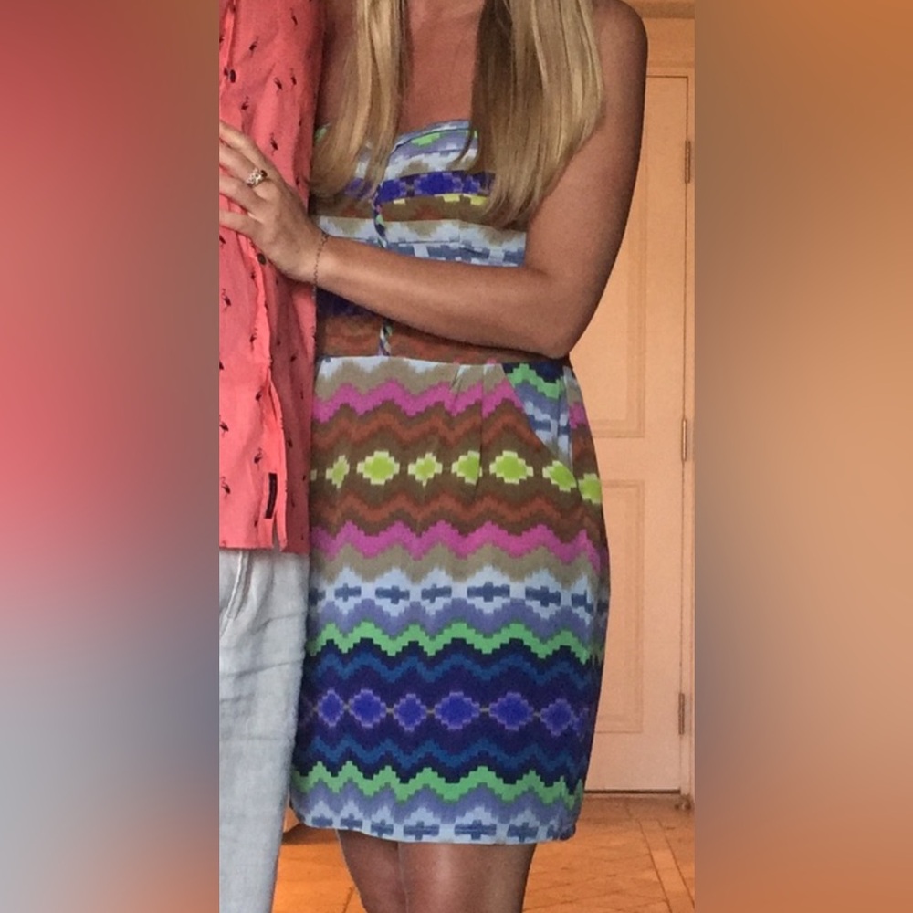 Multicolor dress with pockets and padded breasts